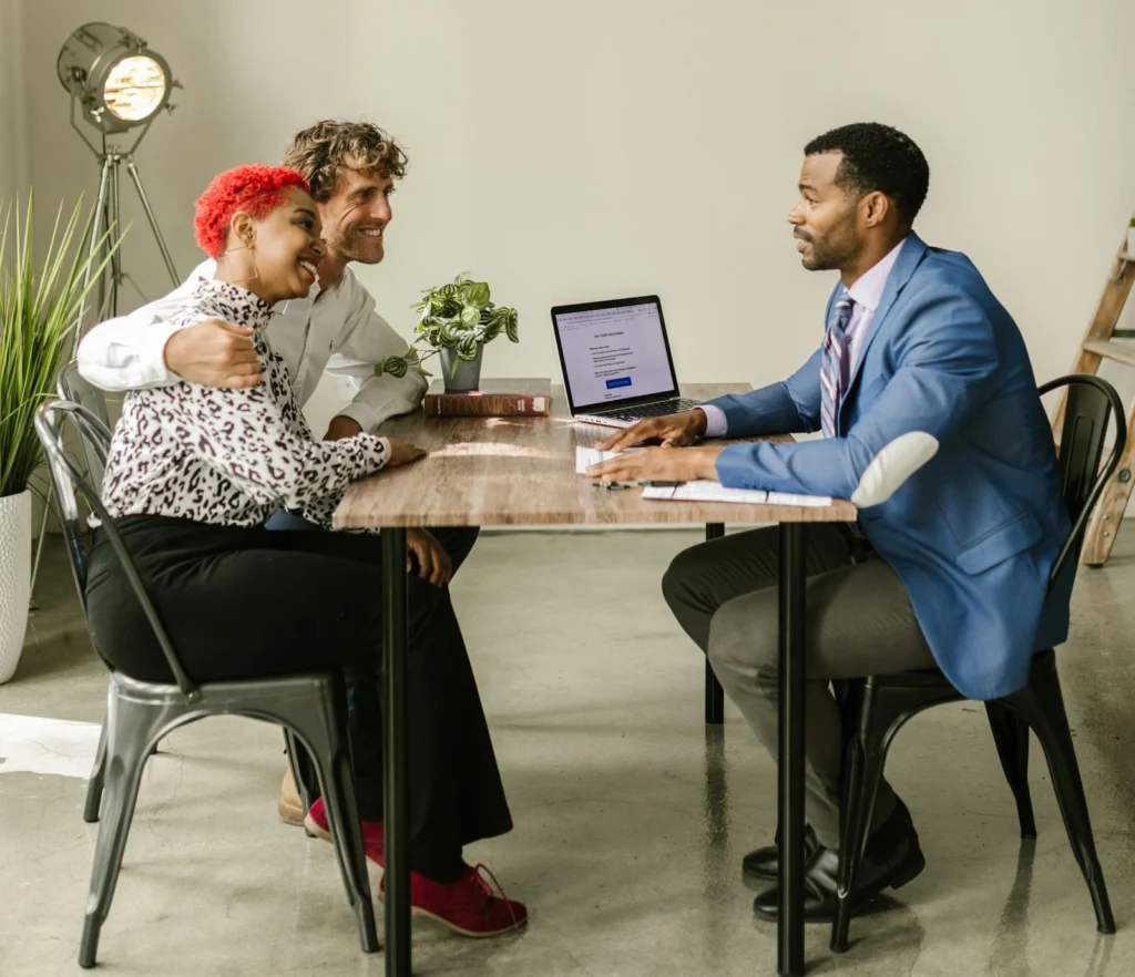 insurance-agent-and-client-talking-smiling